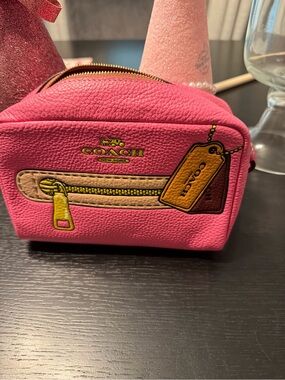Coach Hot Pink Pebbled Leather Cosmetic Case with Graphic Tag